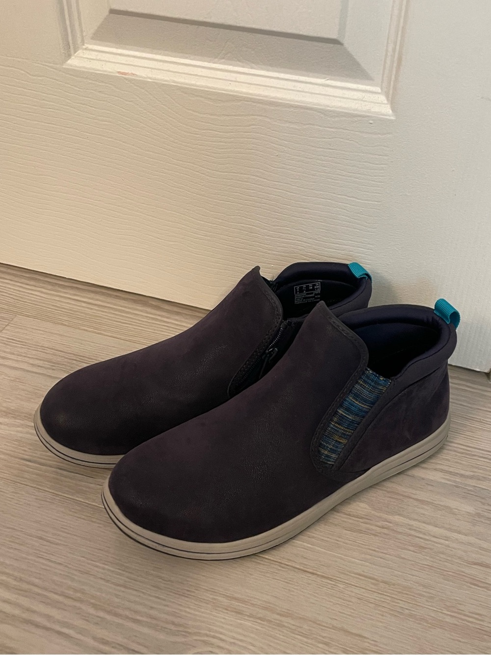 Clarks Women's Dark Navy Ankle Slip-On Booties with Teal Pull Tab